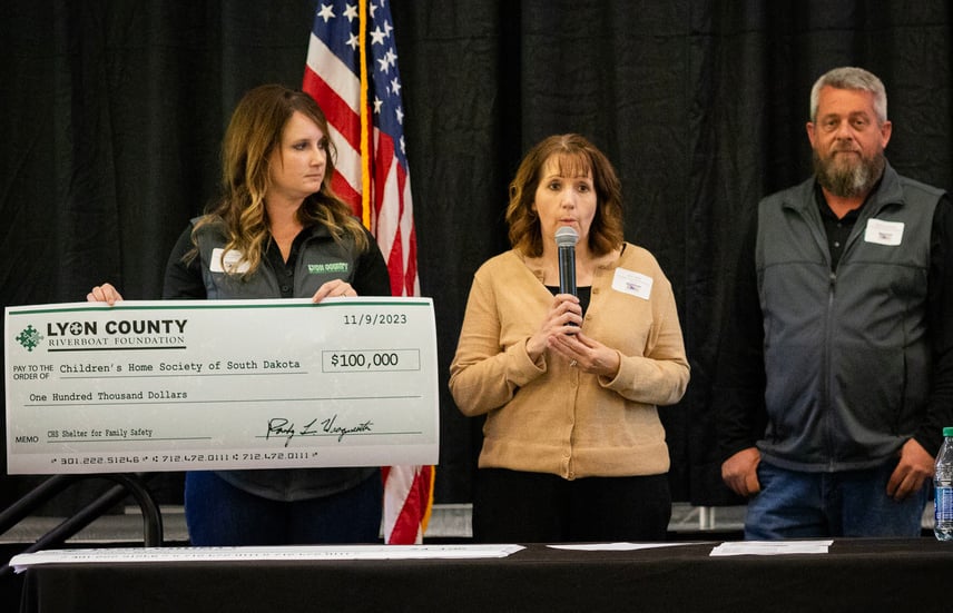 Amy Carter accepted the award for $100,000 on behalf of the Shelter for Family Safety