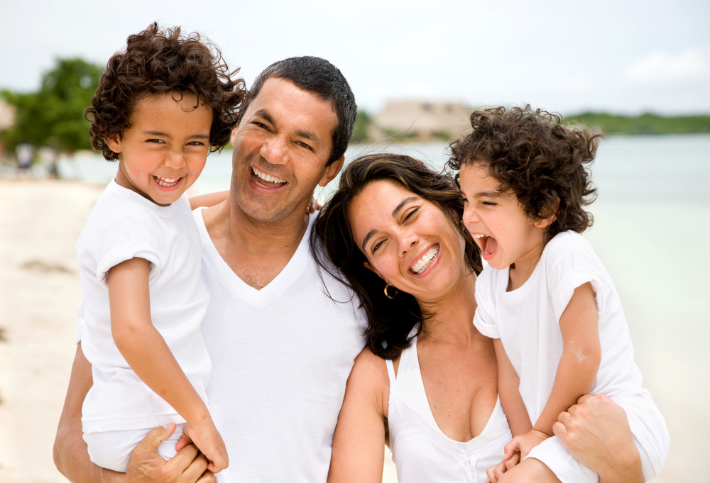 happy family portrait at the beach smiling happy family portrait at the beach smiling